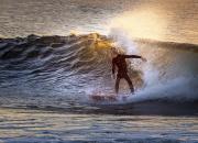 Surfing at dawn - Heather Miles